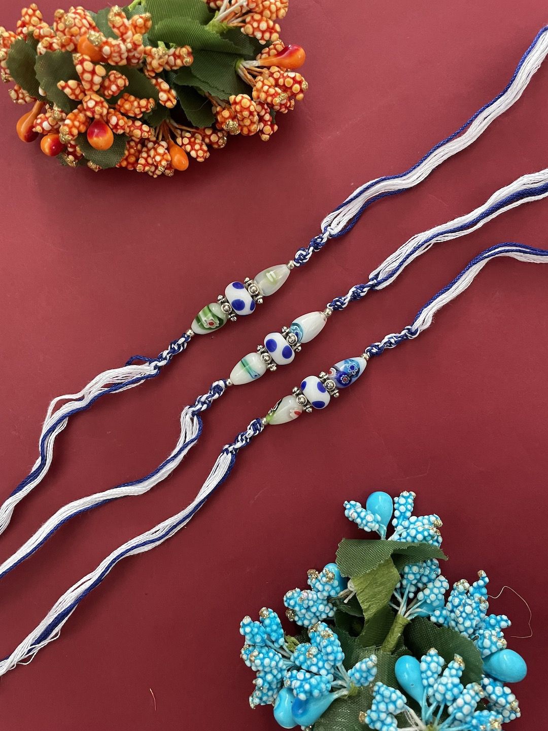 

Digital Dress Room Set of 3 Beaded Thread Rakhis, Blue