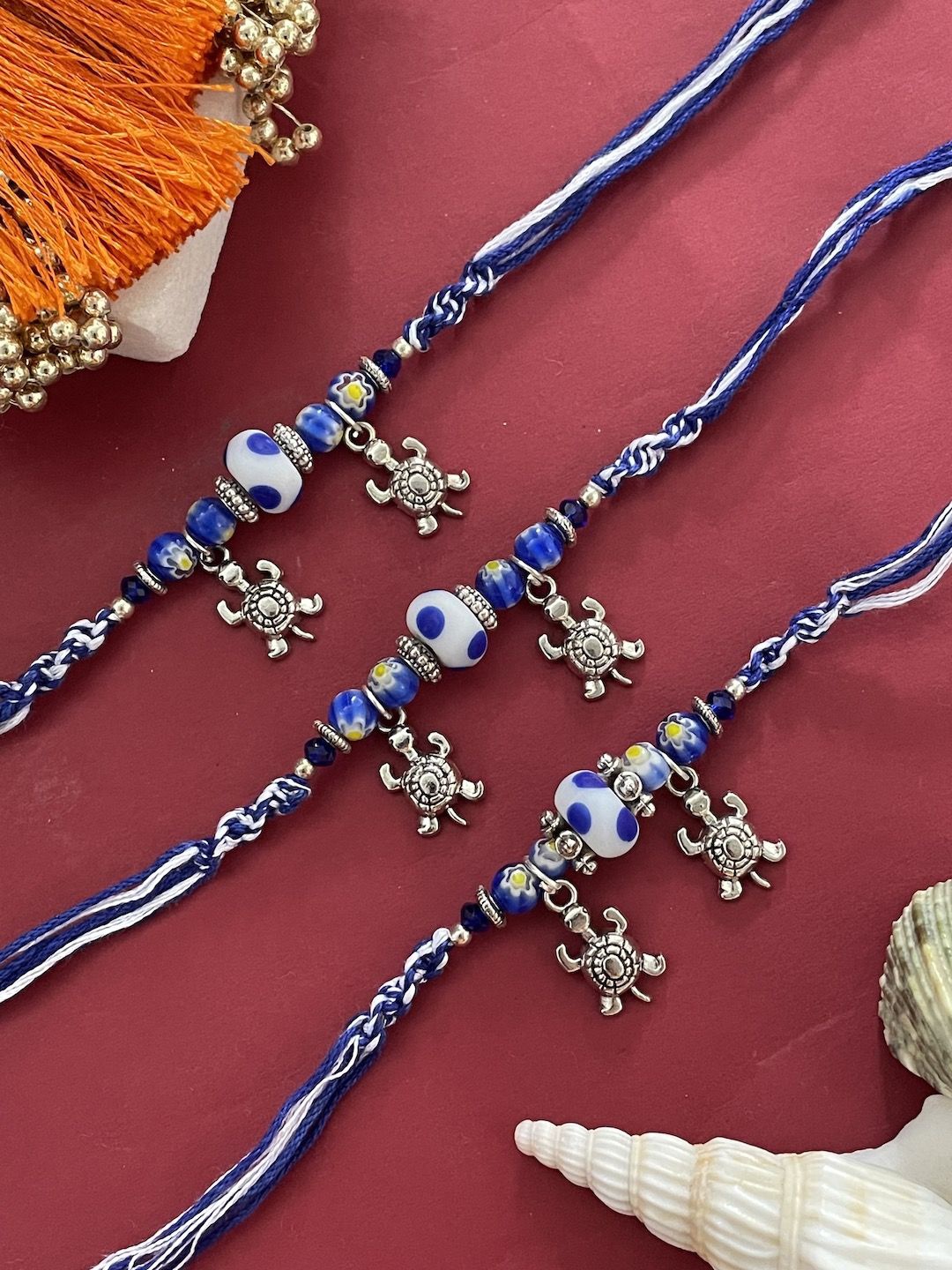 

Digital Dress Room Set of 3 Beaded Thread Rakhis, Blue