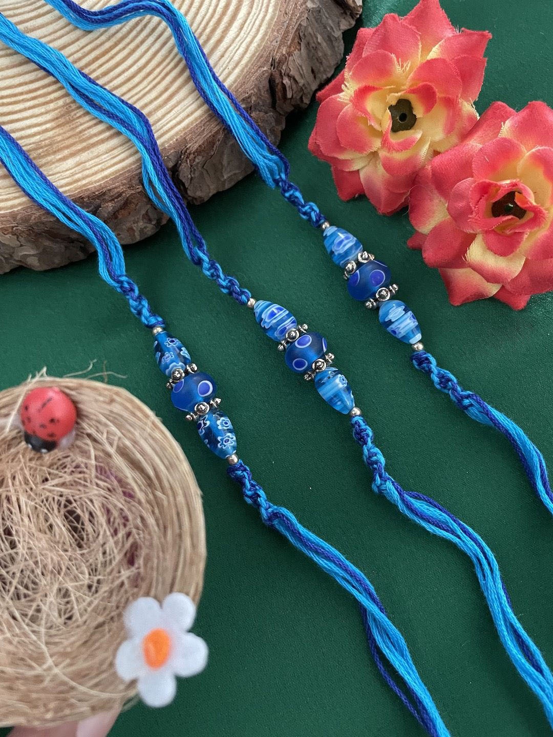 

Digital Dress Room Set of 3 Beaded Thread Rakhis, Blue