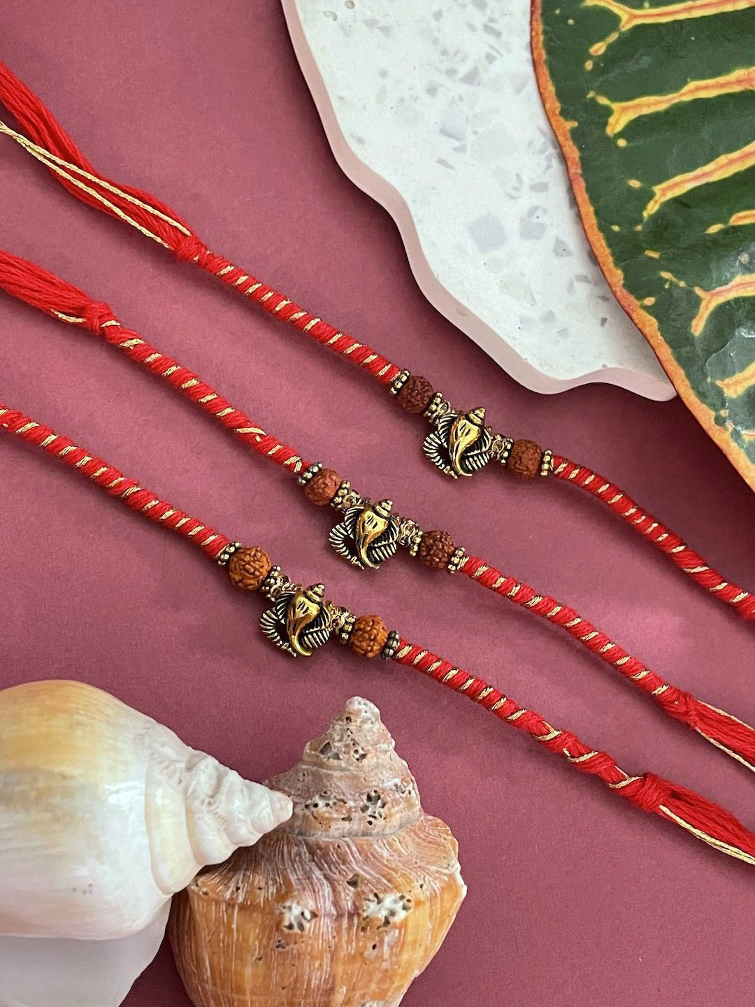 

Digital Dress Room Set of 3 Beaded Thread Rakhis, Red