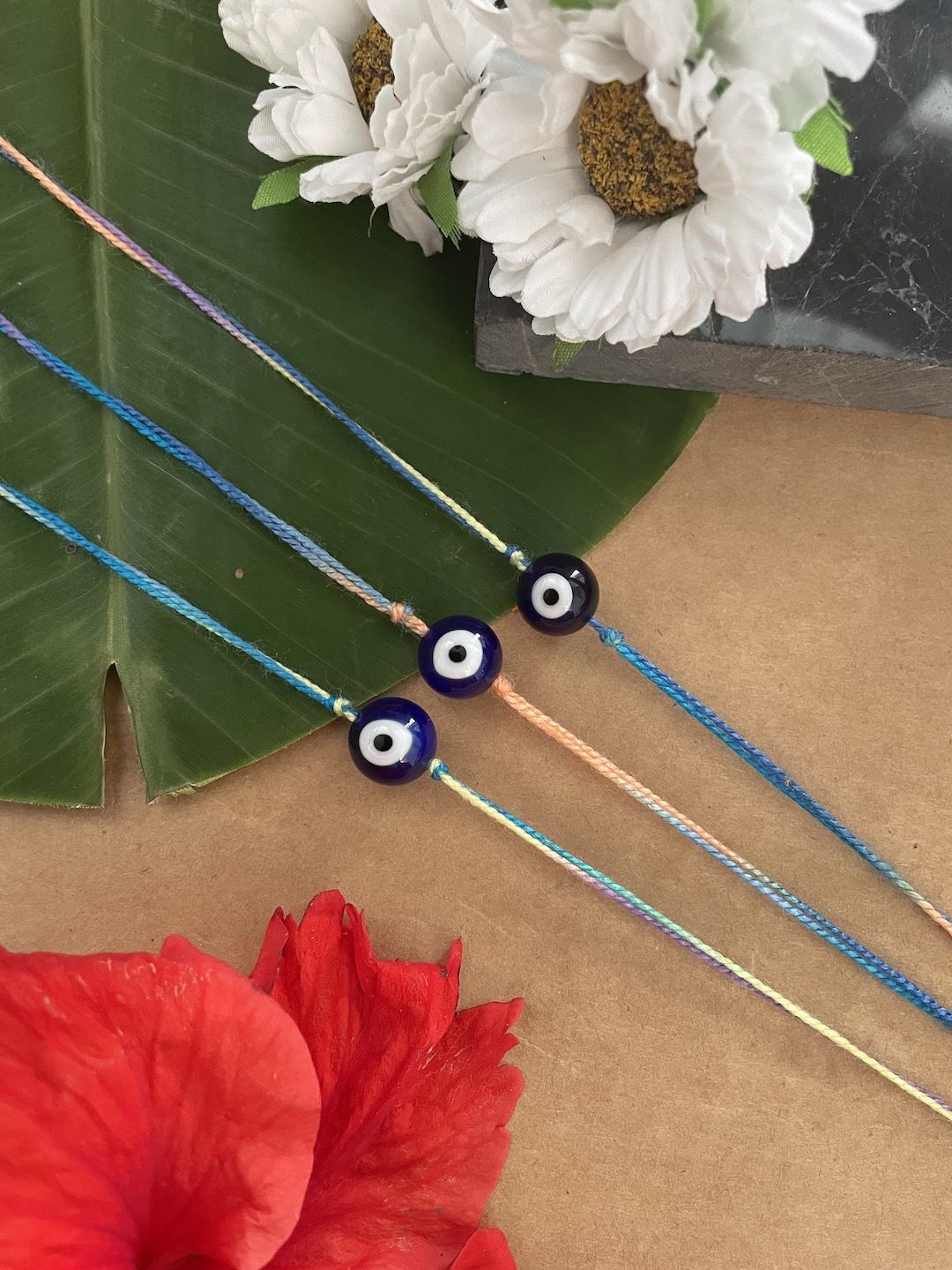 

Digital Dress Room Set Of 3 Beaded Thread Rakhis, Blue