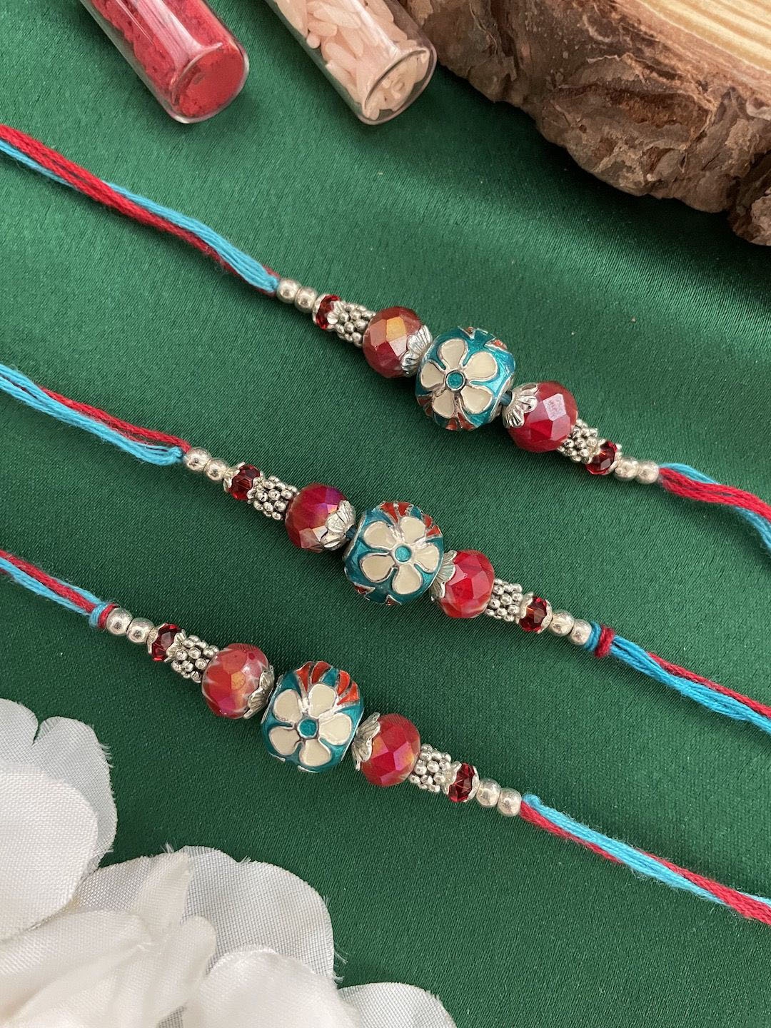 

Digital Dress Room Set Of 3 Beaded Thread Rakhis, Blue