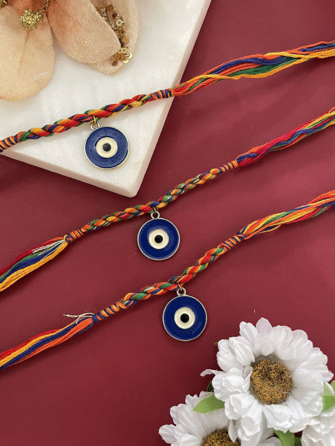 

Digital Dress Room Set Of 3 Thread Rakhis, Red