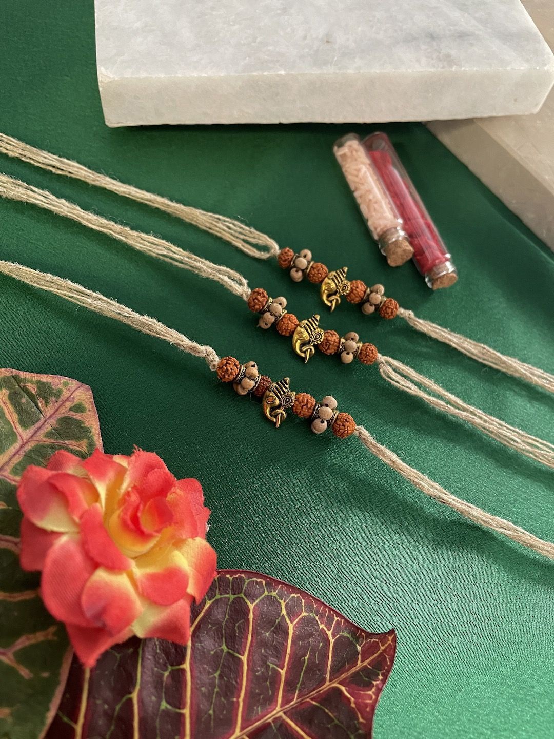 

Digital Dress Room Set of 3 Beaded Thread Rakhi, White