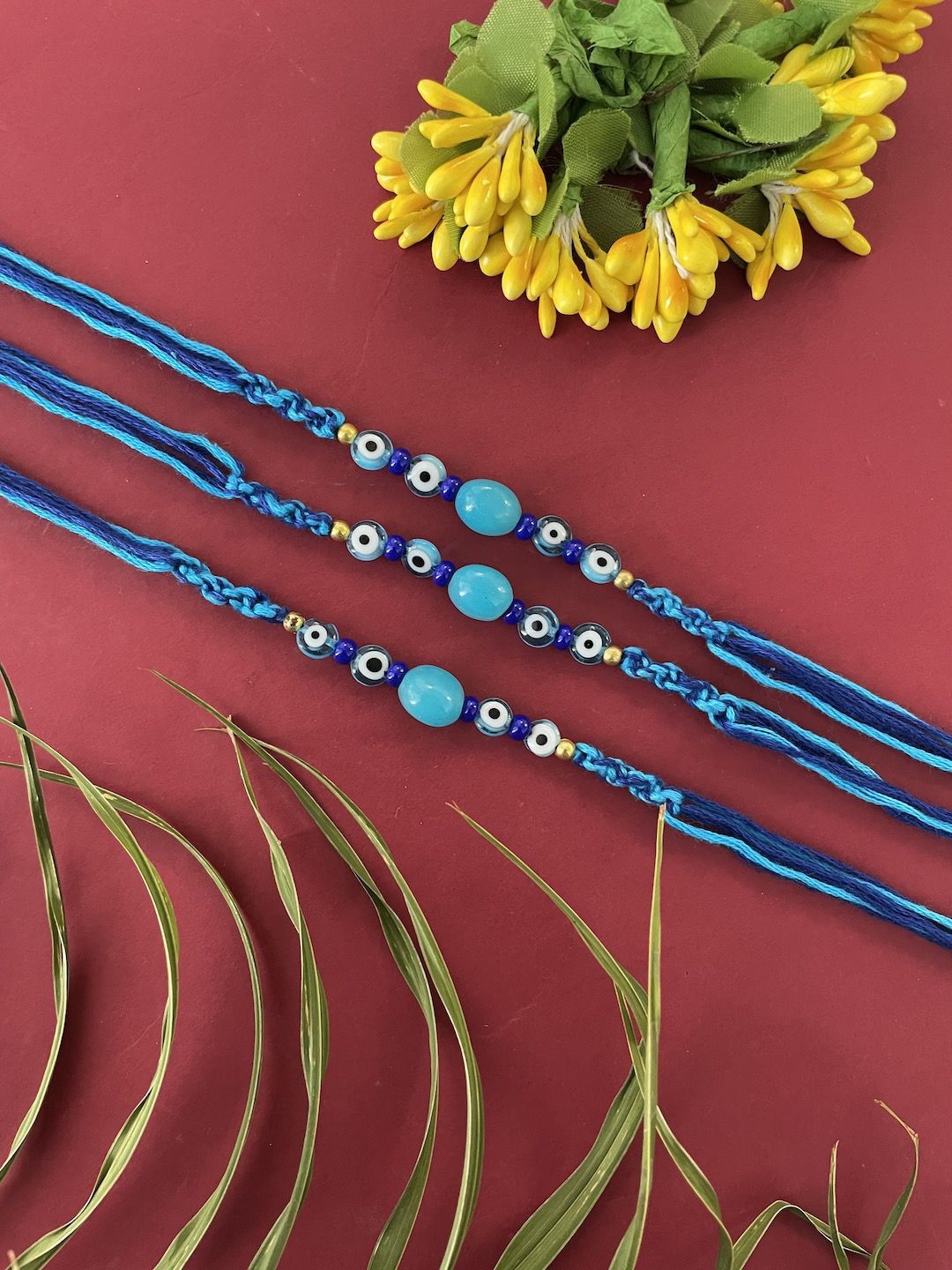 

Digital Dress Room Set of 3 Evil Eye Beaded Thread Rakhi, Blue
