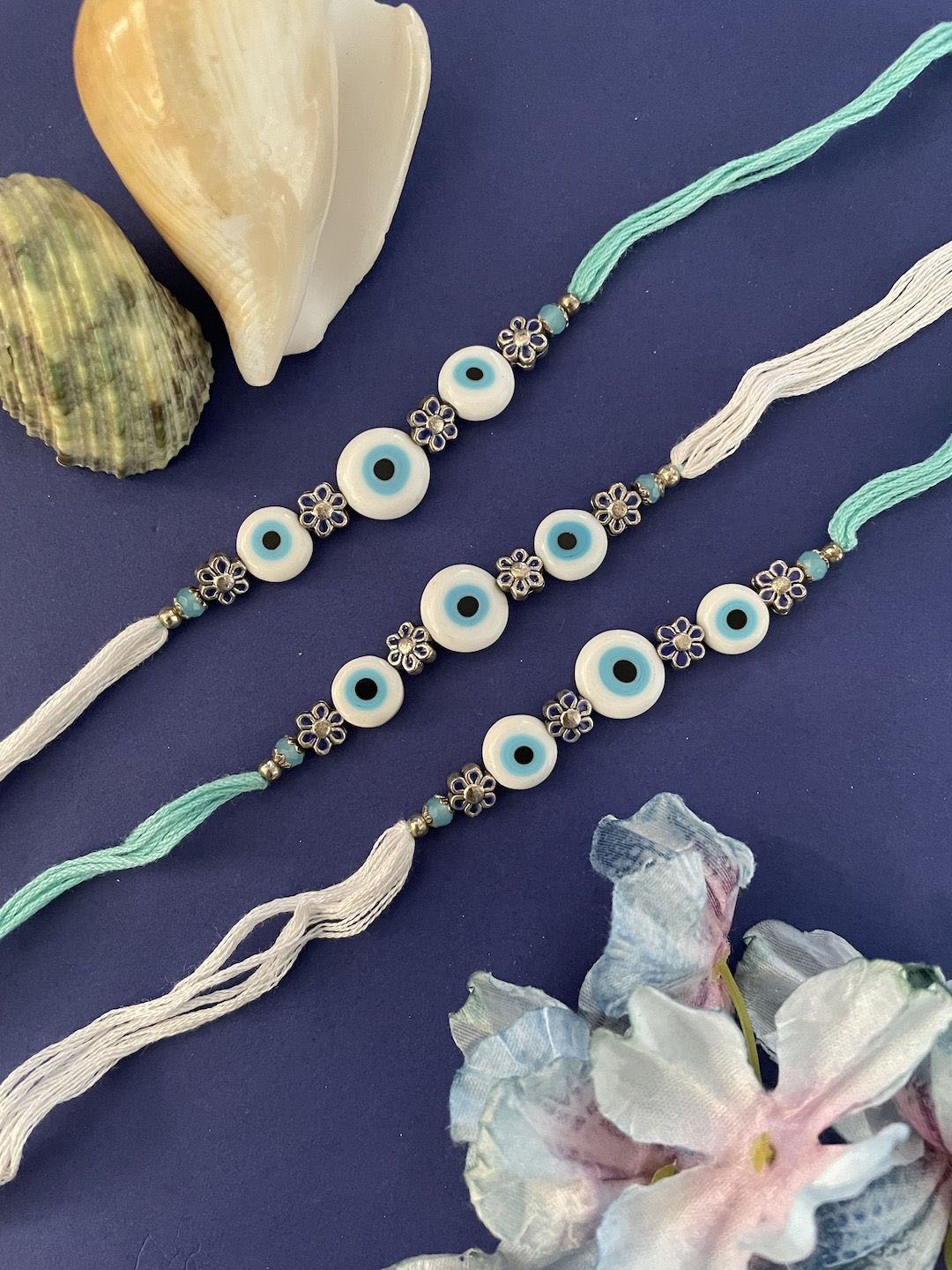 

Digital Dress Room Set of 3 Evil Eye Beaded Thread Rakhi, Blue