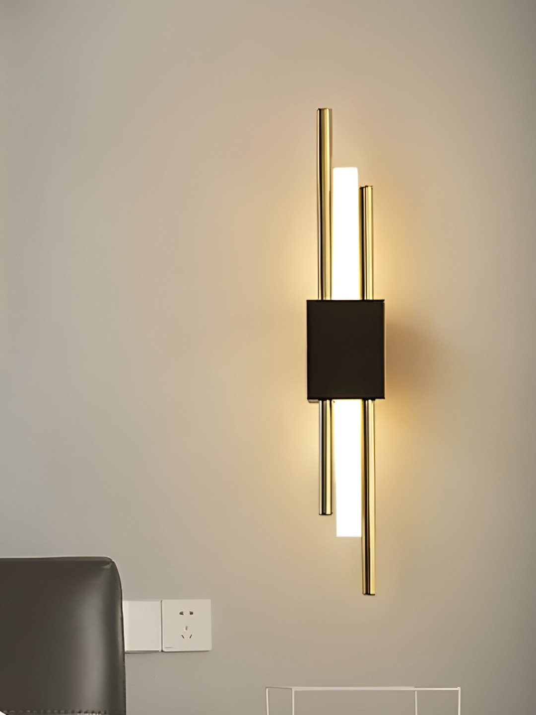 

Whiteray Black & Gold Toned Contemporary Abstract Shaped Metal Wall Lamp