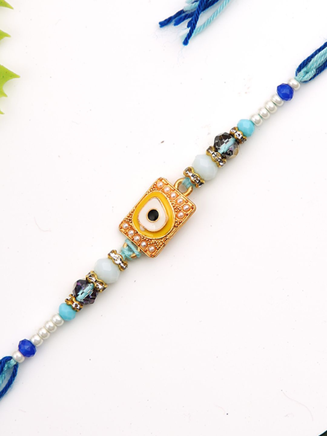 

Aapno Rajasthan Beaded Rakhi With Roli Chawal & Greetings Card, Blue