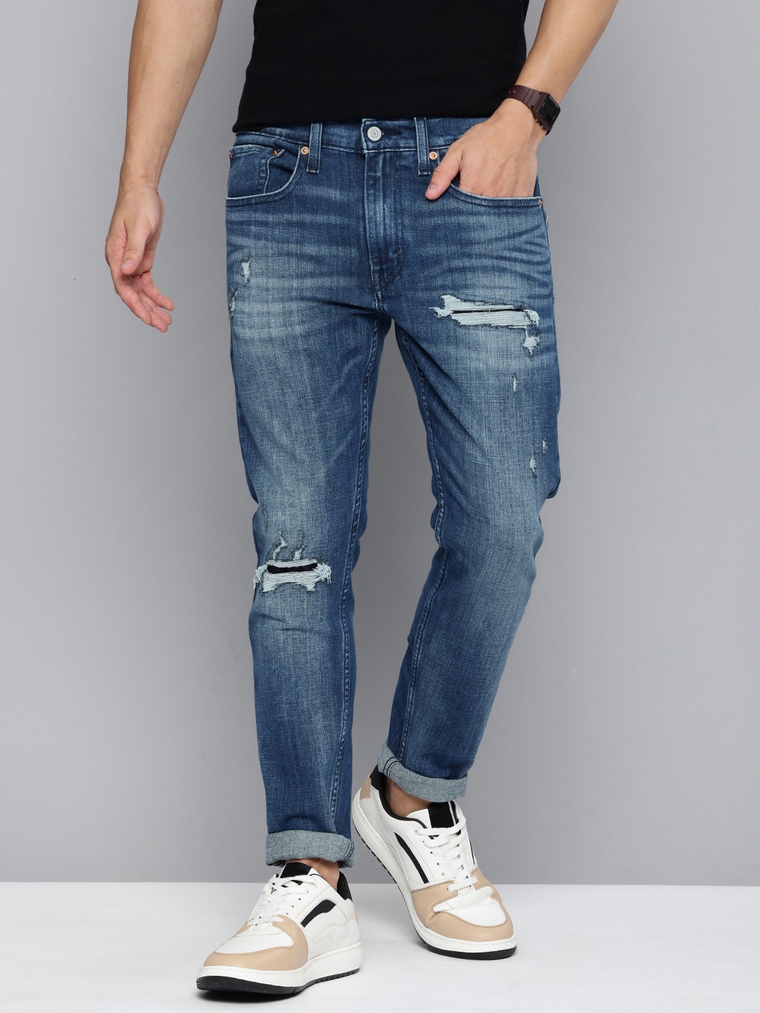 

Levis Men Skinny Tapered Fit Mildly Distressed Heavy Fade Stretchable Jeans, Blue