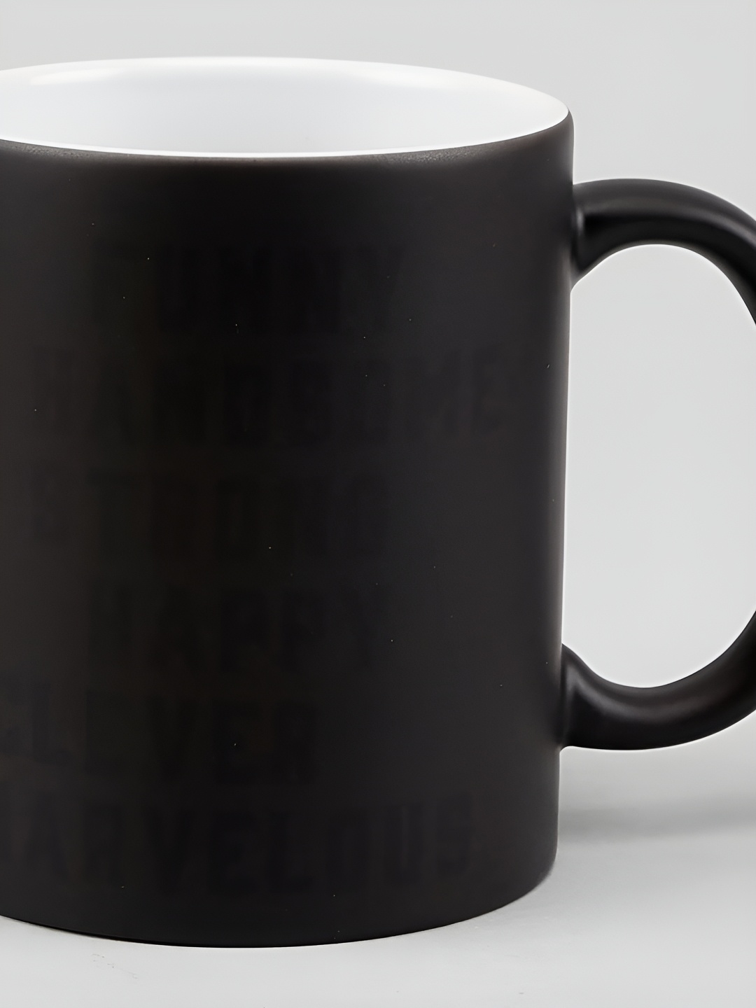 

fnp White & Black Printed Ceramic Glossy Magic Mug 325ml