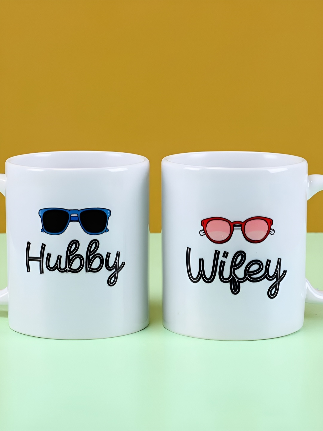 

fnp White & Black 2 Pieces Typography Printed Ceramic Glossy Mugs 325ml Each