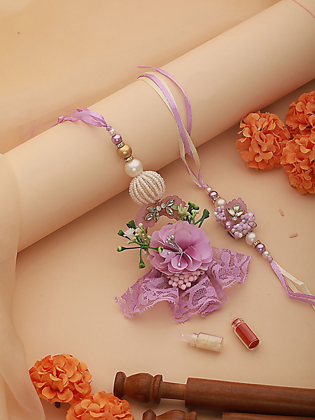 

Jazz and Sizzle Floral & Lace Work Bhaiya Bhabhi Rakhi with Roli & Chawal, Purple
