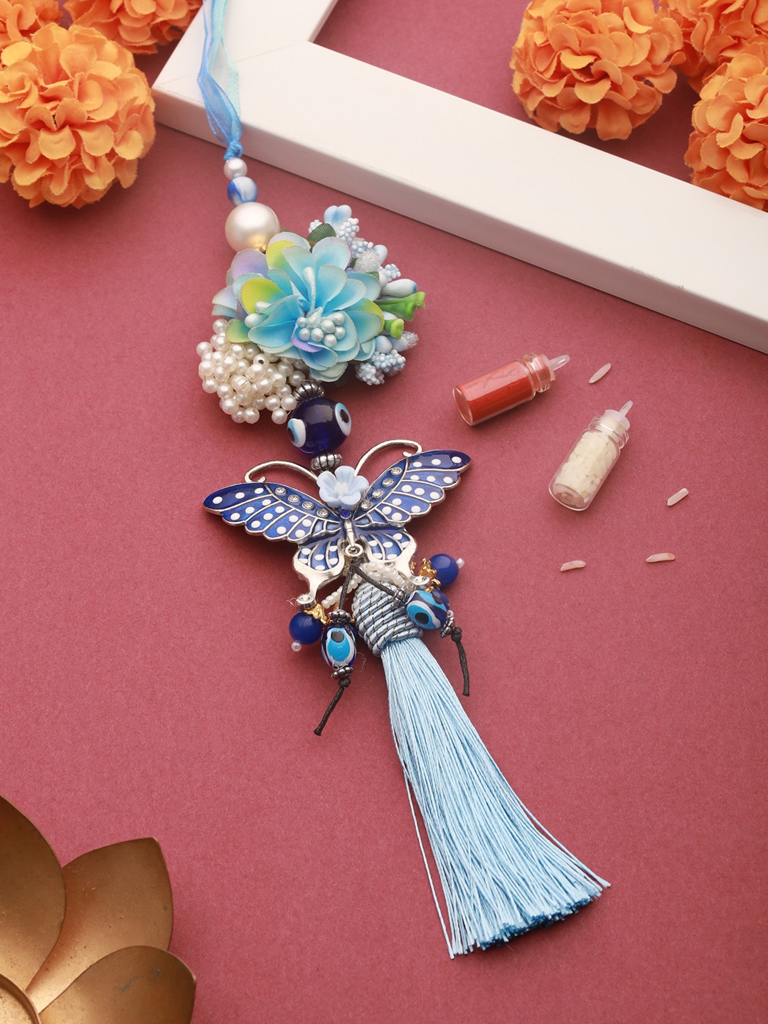 

Jazz and Sizzle Butterfly Shaped Evil Eye Key Chain Floral Lumba Rakhi With Roli & Chawal, Blue