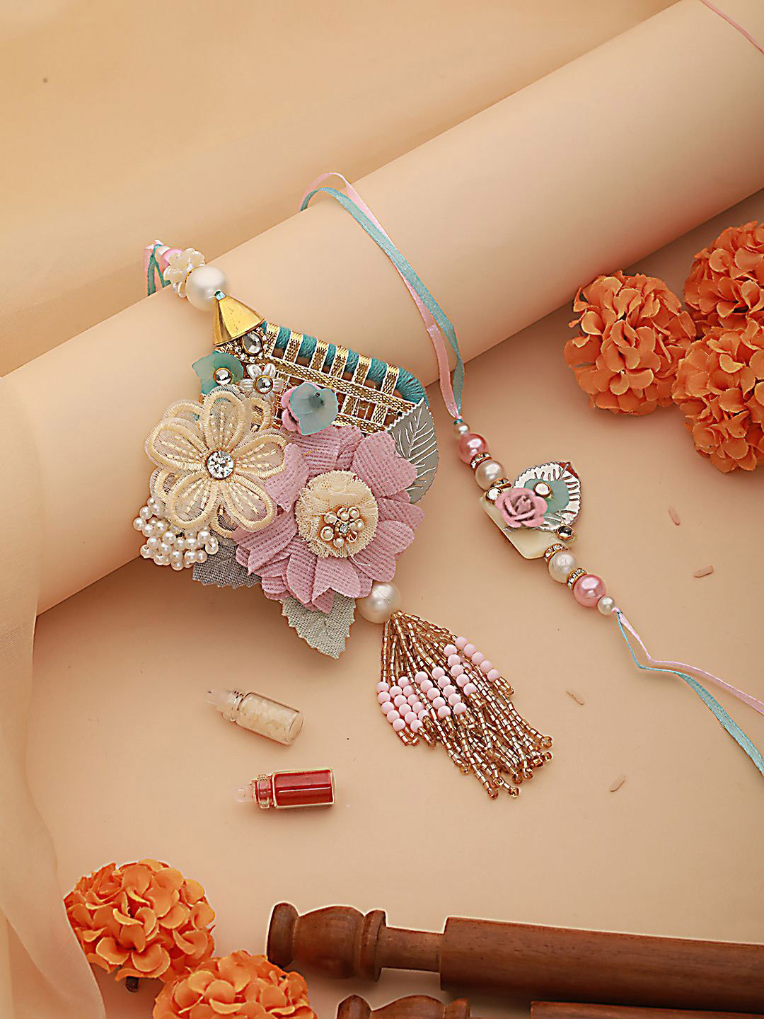 

Jazz and Sizzle Floral Bhaiya Bhabhi Rakhi With Roli & Chawal, Pink