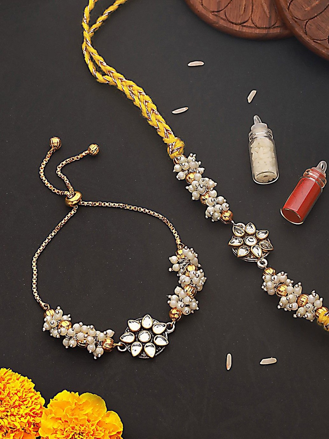 

Jazz and Sizzle Kundan Studded & Mogra Beaded Bhaiya Bhabhi Rakhi With Roli & Chawal, Yellow