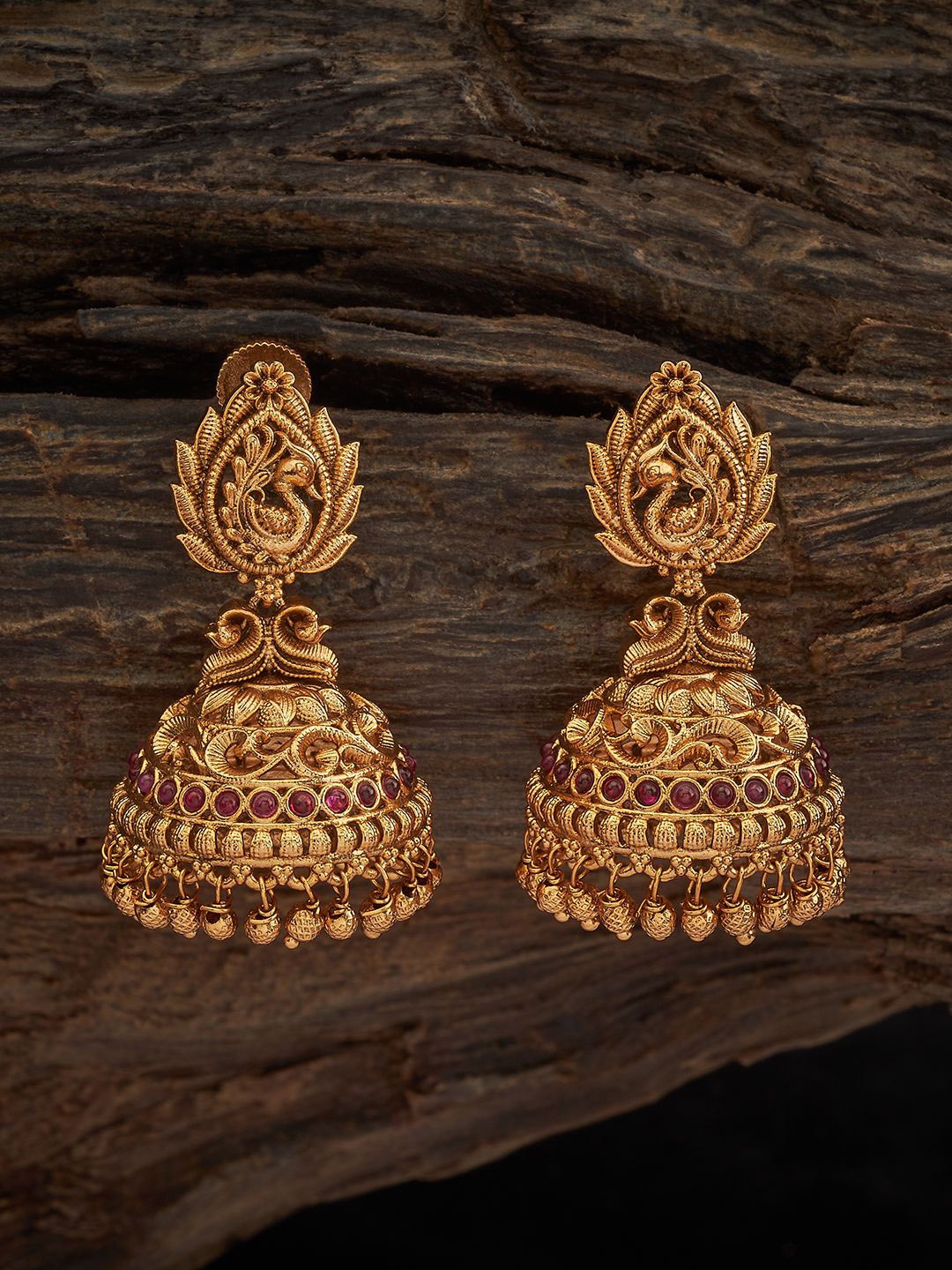 

Kushal's Fashion Jewellery Gold-Plated Stone Studded Dome Shaped Antique Jhumkas