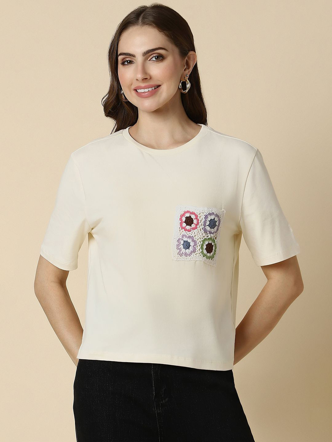 

Allen Solly Woman Solid Round Neck T-shirt, Cream