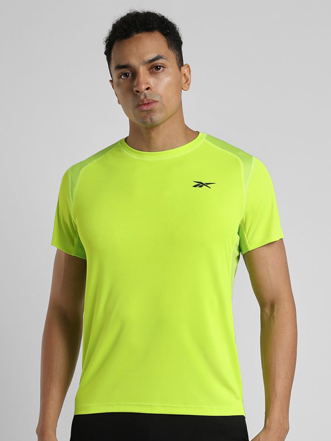 

Reebok Men Solid Round Neck T-Shirt, Green
