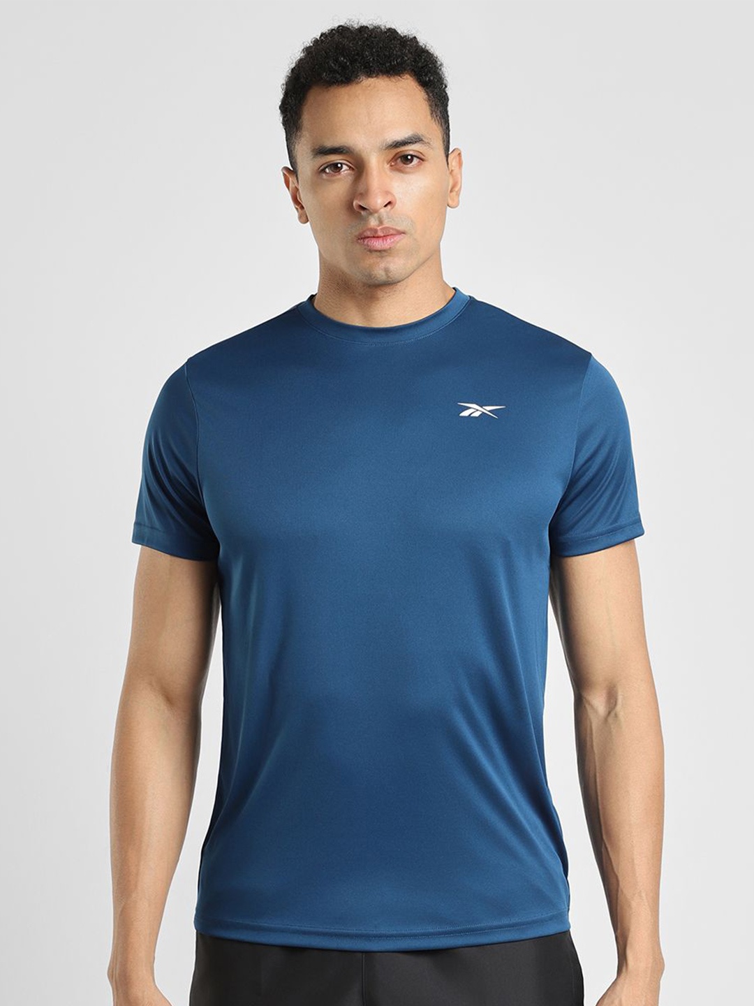 

Reebok Men Solid Round Neck T Shirt, Navy blue