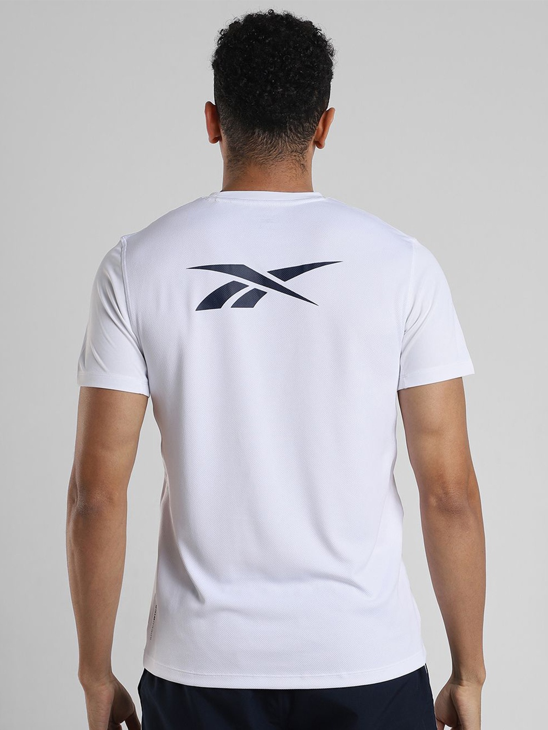 

Reebok Men Solid Round Neck T-Shirt, White