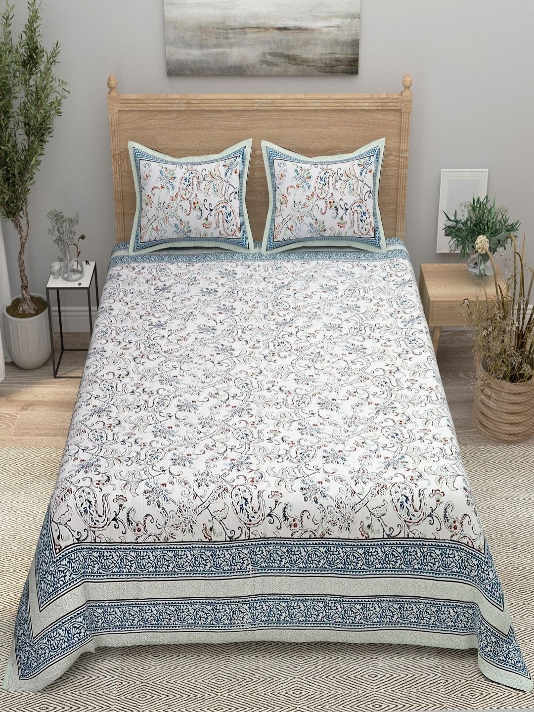 

Aura Turquoise Blue Printed 144 TC Pure Cotton Double King Bedsheet With 2 Pillow Covers