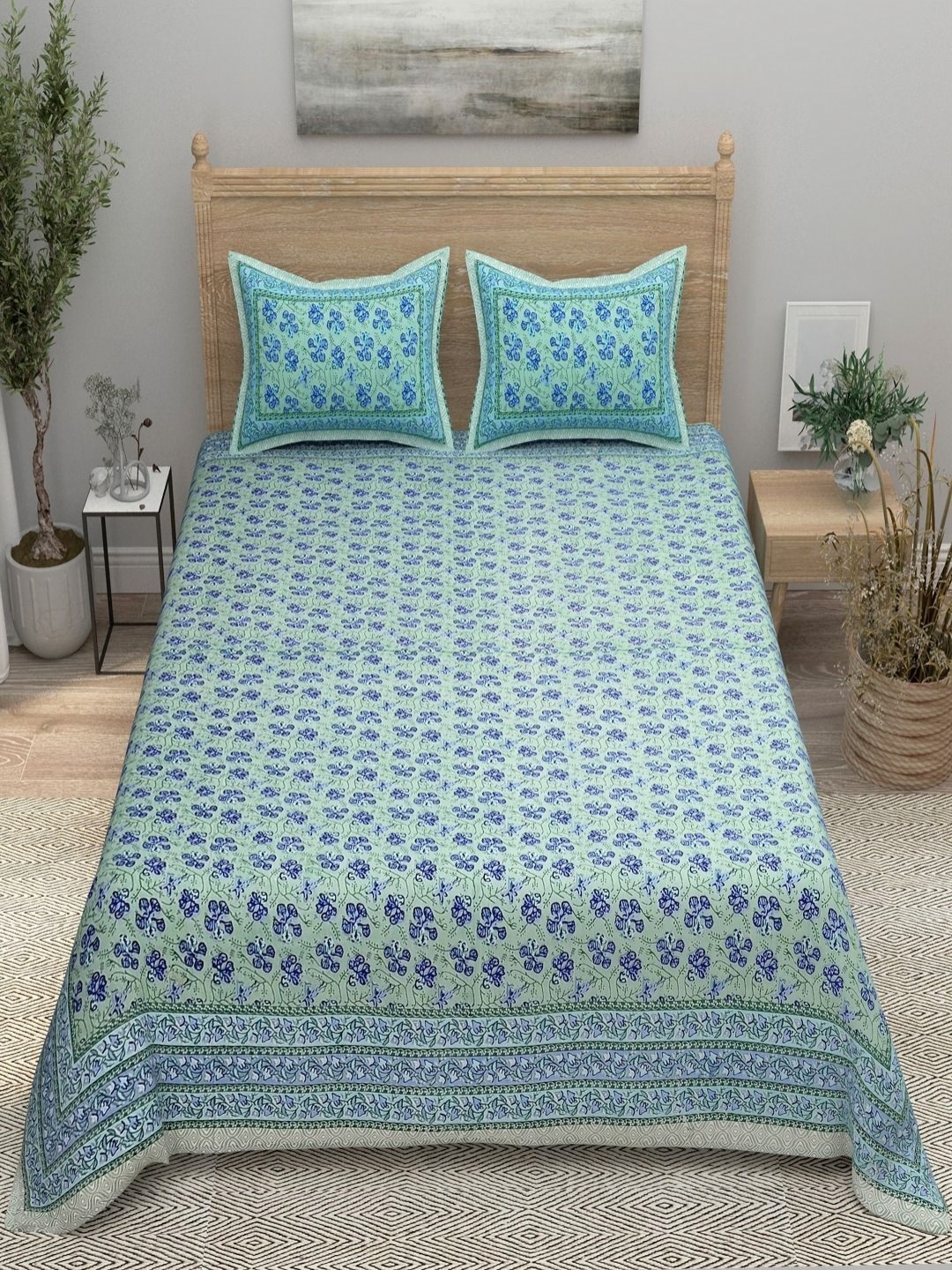 

Aura Turquoise Blue Printed 144 TC Pure Cotton Double King Bedsheet With 2 Pillow Covers