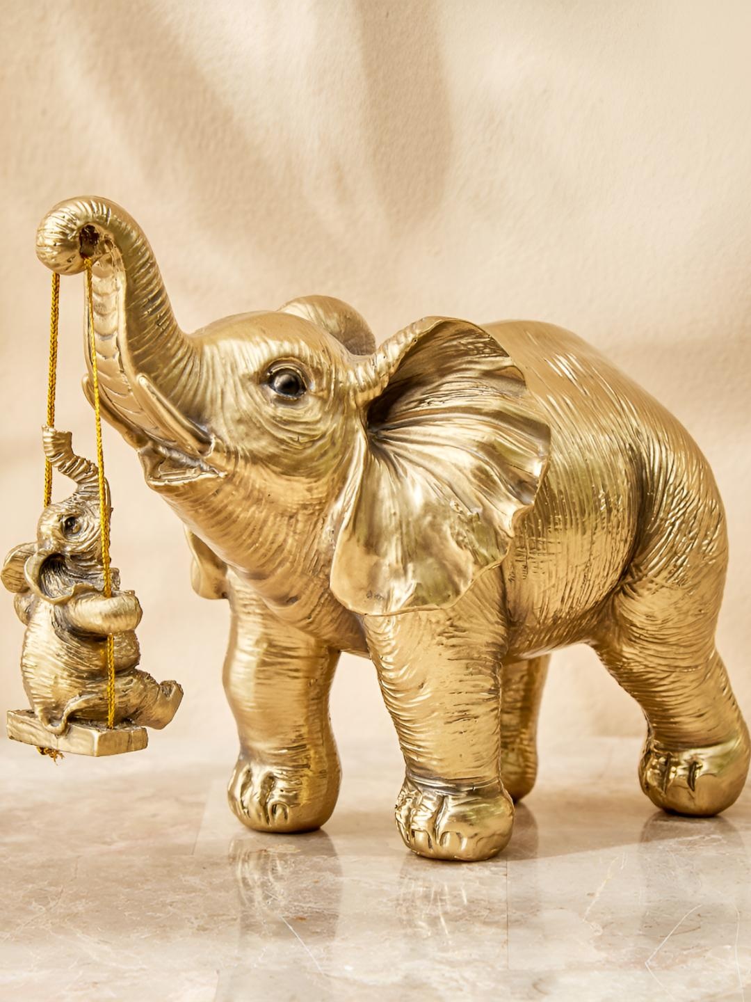 

Home Centre Gold-Toned Textured Figurine Showpiece