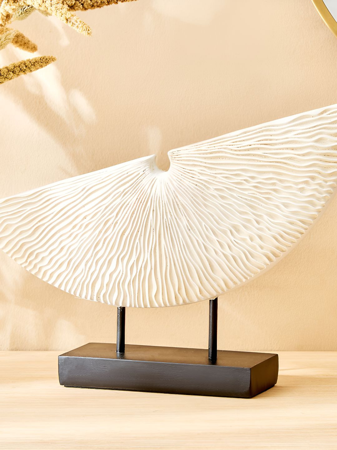 

Home Centre White Textured Figurine Showpiece