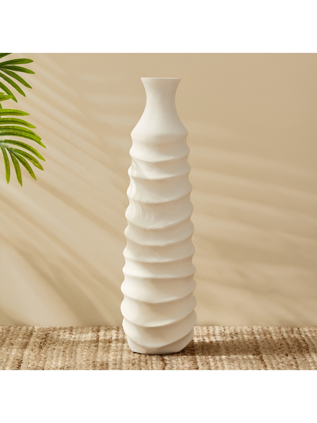 

Home Centre Off White Spiral Floor Vase