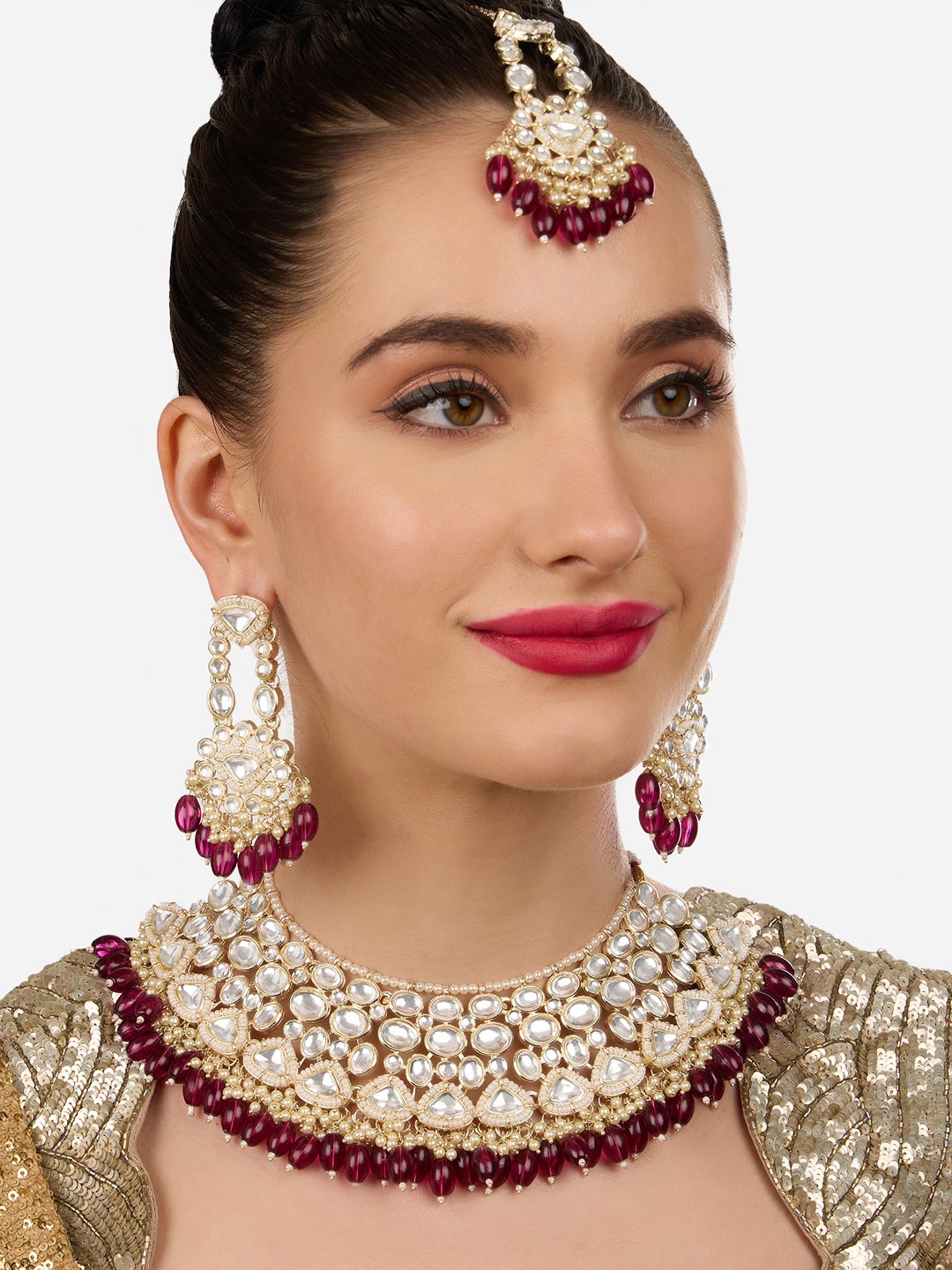 

Zaveri Pearls Gold-Plated Stone Studded & Beaded Jewellery Set
