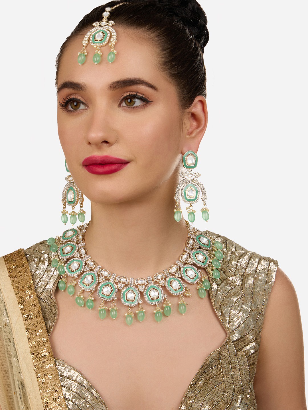 

Zaveri Pearls Gold-Plated American Diamond Studded & Beaded Jewellery Set