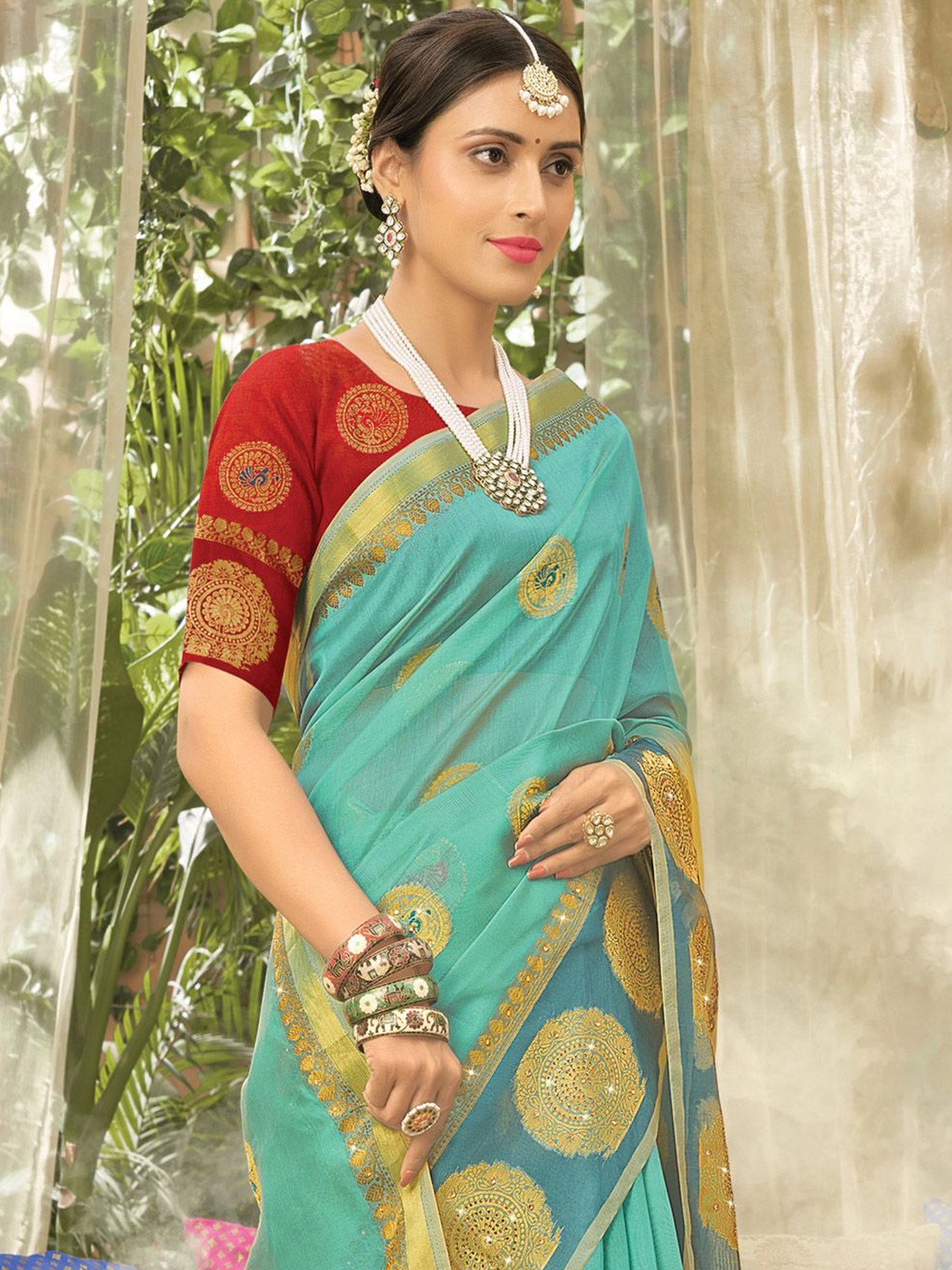 

Exclusiva Woven Design Zari Organza Saree, Sea green