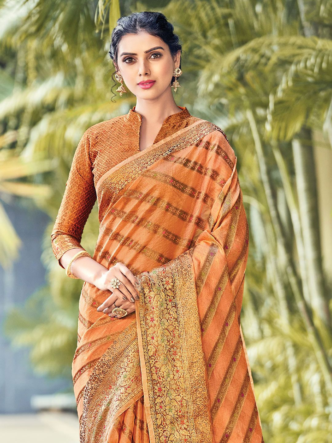 

Exclusiva Ethnic Motif Zari Woven Striped Saree, Orange