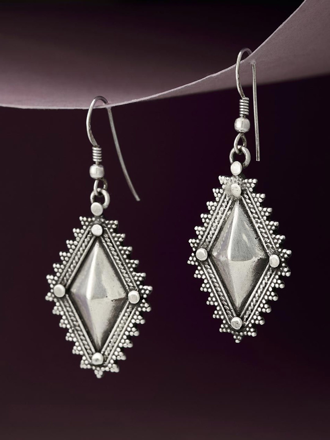 

Fabindia Silver-Plated Contemporary Oxidised Drop Earrings