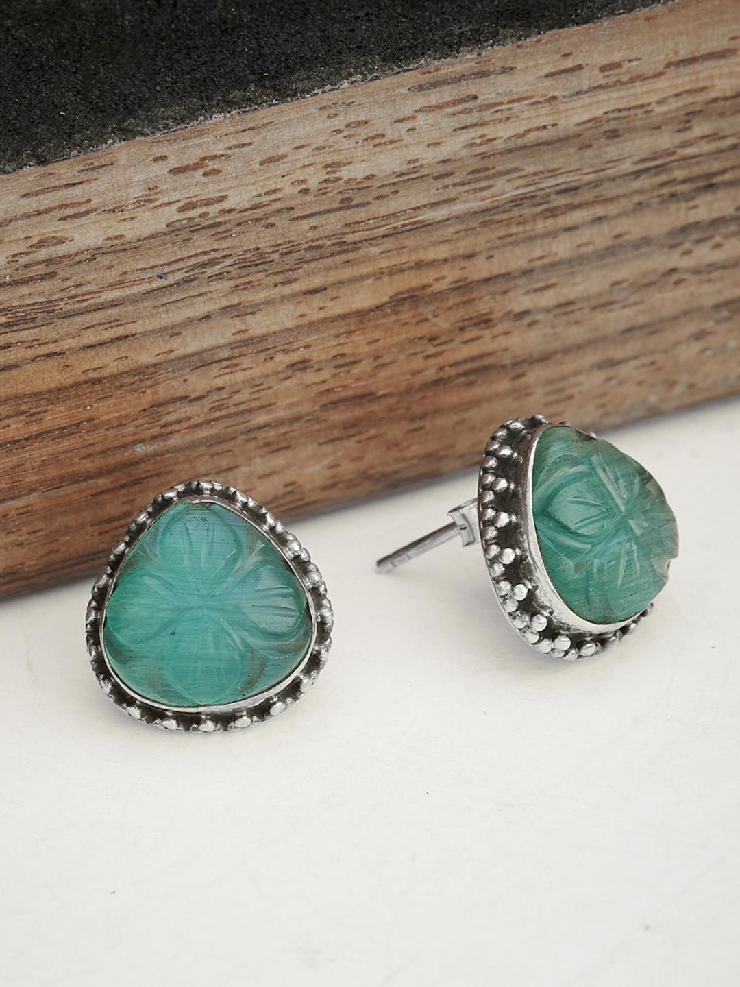 

Fabindia Contemporary Silver-Plated Artificial Stones Studs Earrings