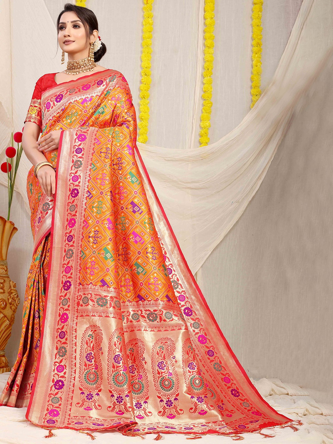 

Mitera Woven Design Zari Patola Saree, Orange