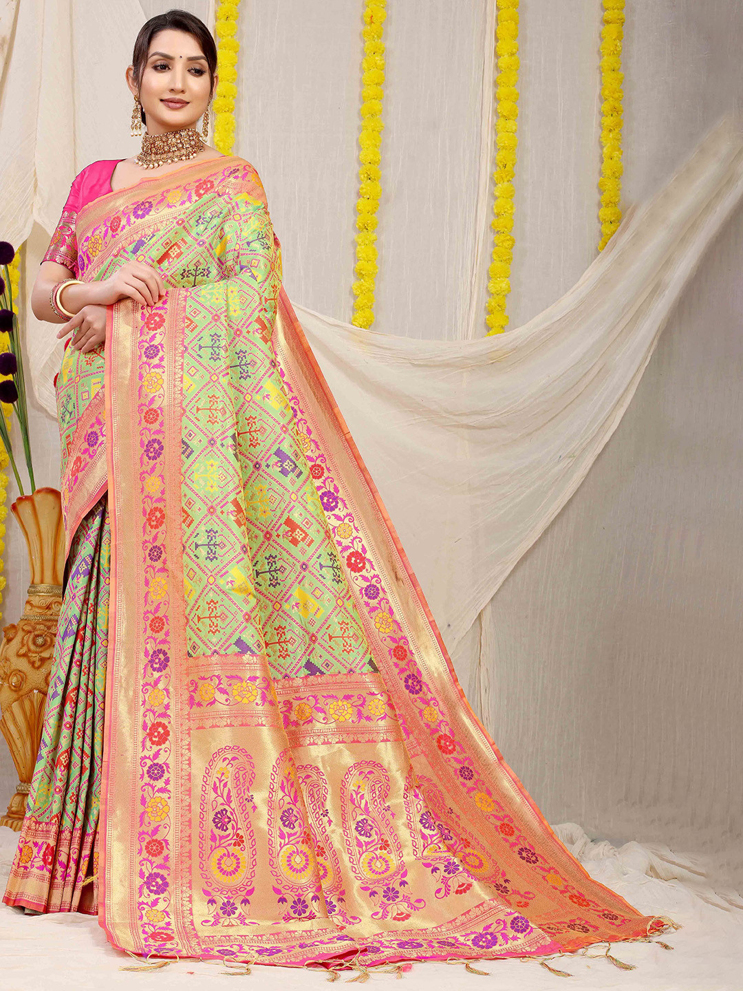

Mitera Woven Design Zari Patola Saree, Green
