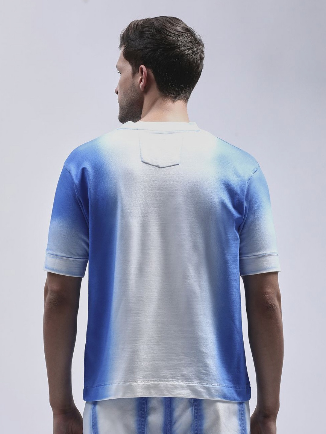 

Henceforth Men Drop Shoulder Sleeves Spray Printed Cotton Oversized T-shirt, Blue
