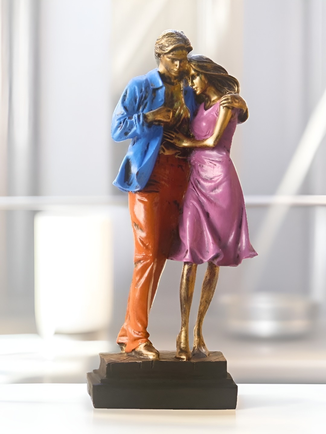 

BECKON VENTURE Gold-Toned Couple Decorative Showpiece