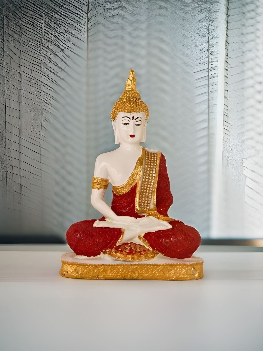 

BECKON VENTURE Red & Gold Toned Religious Idol Showpiece