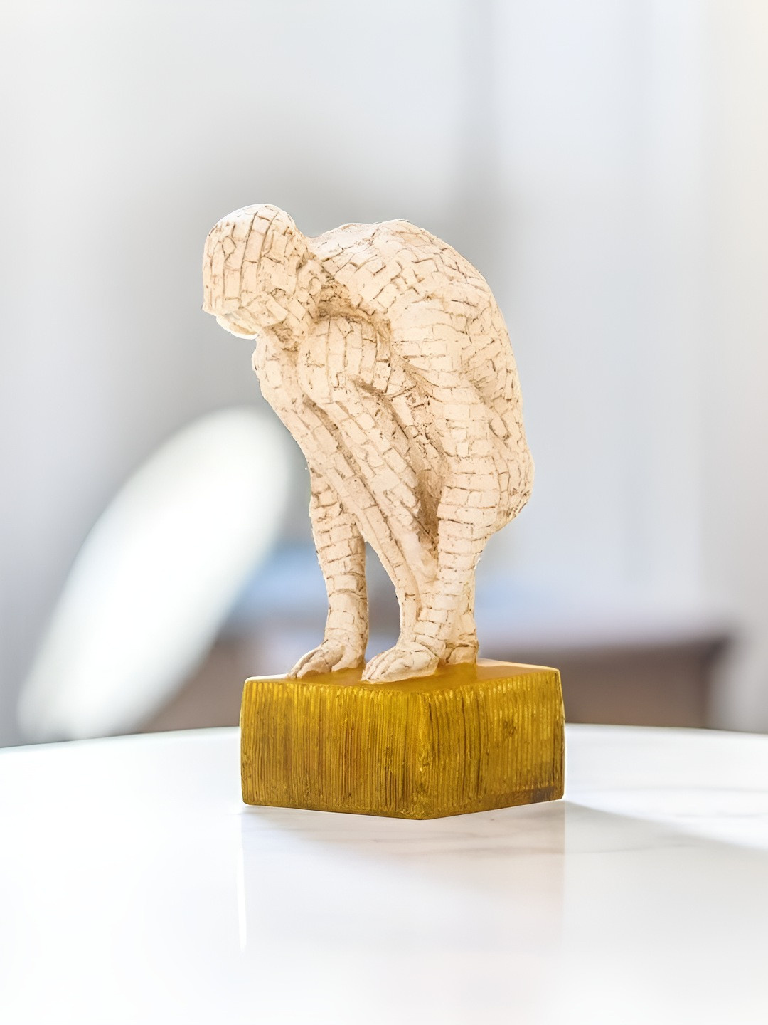 

BECKON VENTURE Beige Textured Figurine Showpiece