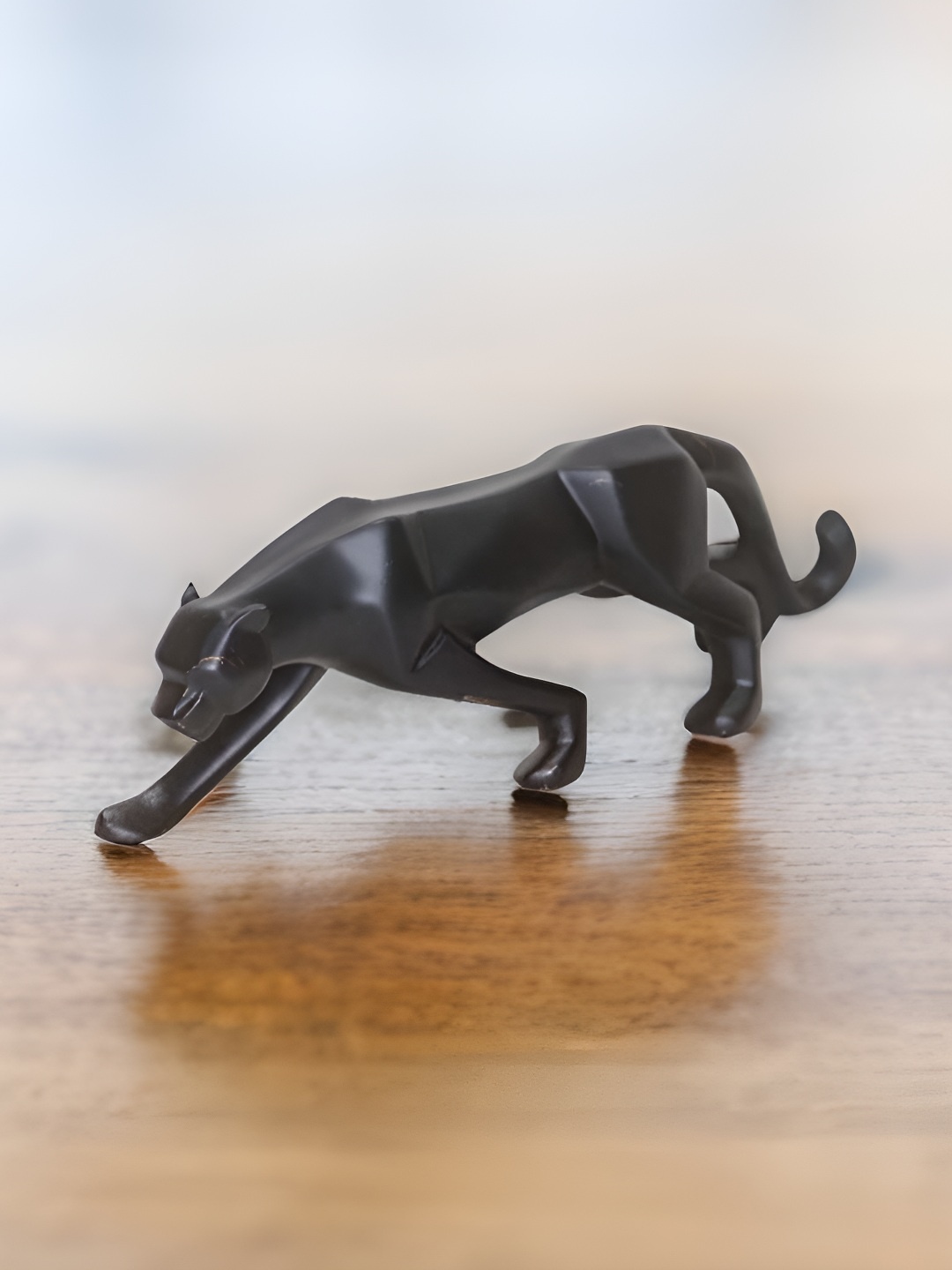 

BECKON VENTURE Black Textured Figurine Showpiece