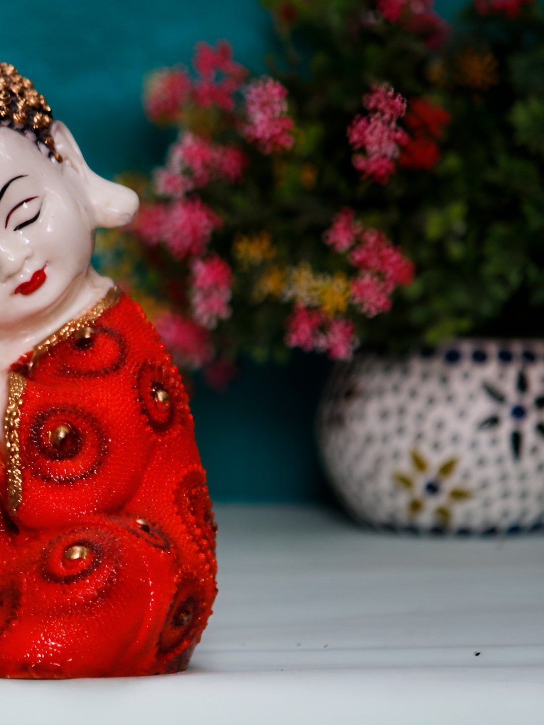 

BECKON VENTURE Red & Cream Embellished Buddha Idol Showpiece
