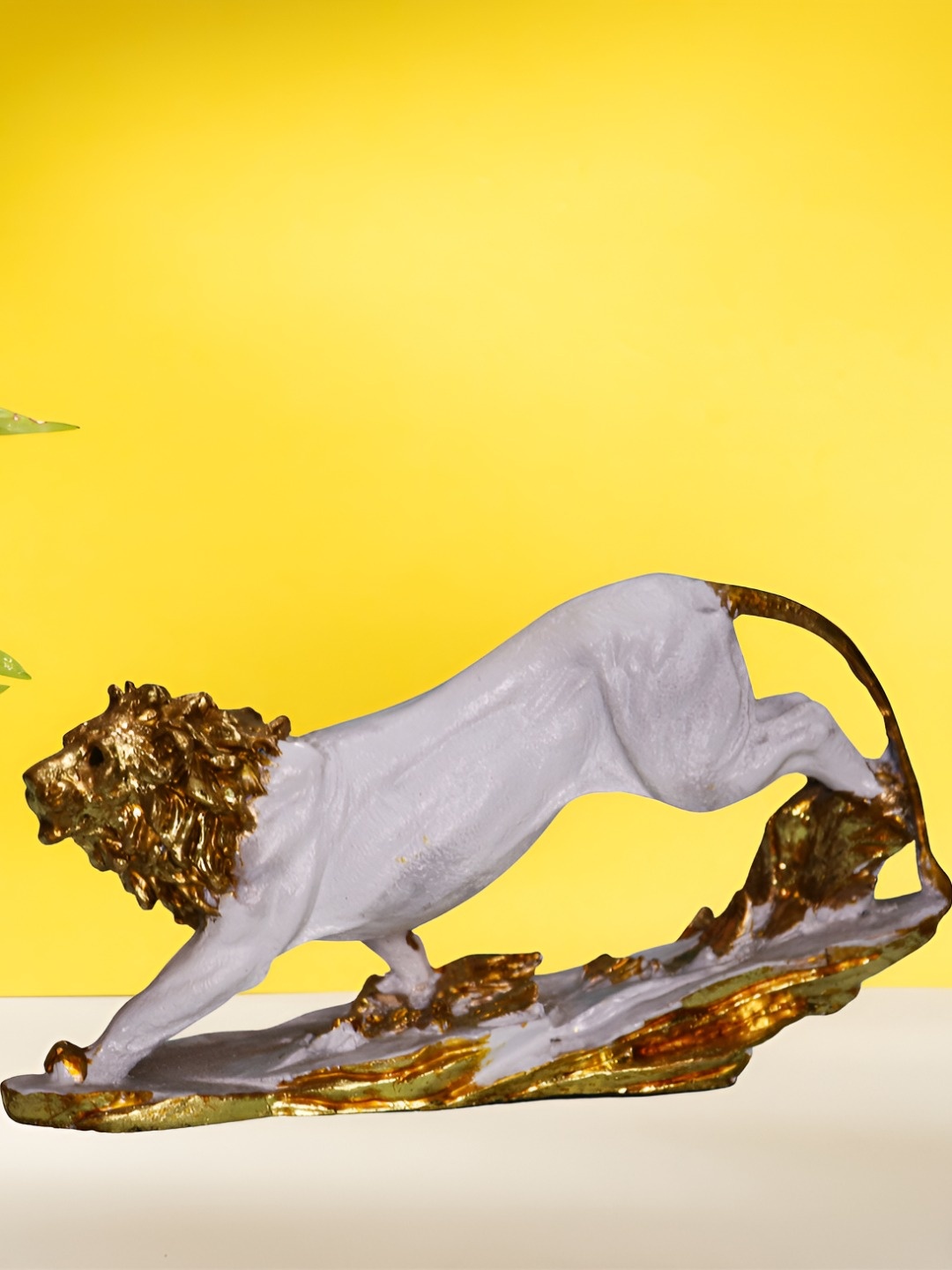 

BECKON VENTURE White & Gold Toned Textured Lion Figurine Showpiece