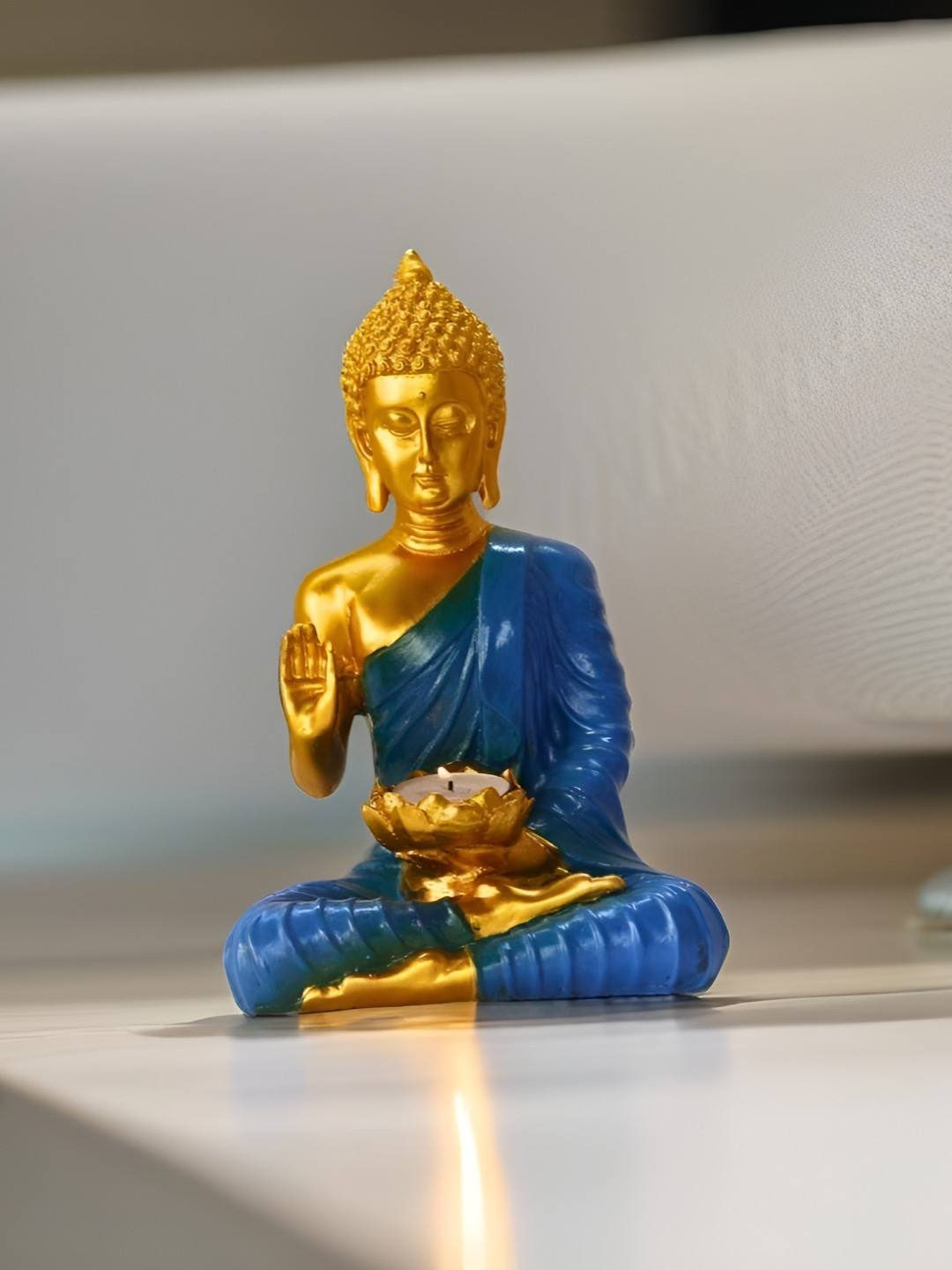 

BECKON VENTURE Blue & Gold toned Buddha Idol Showpiece