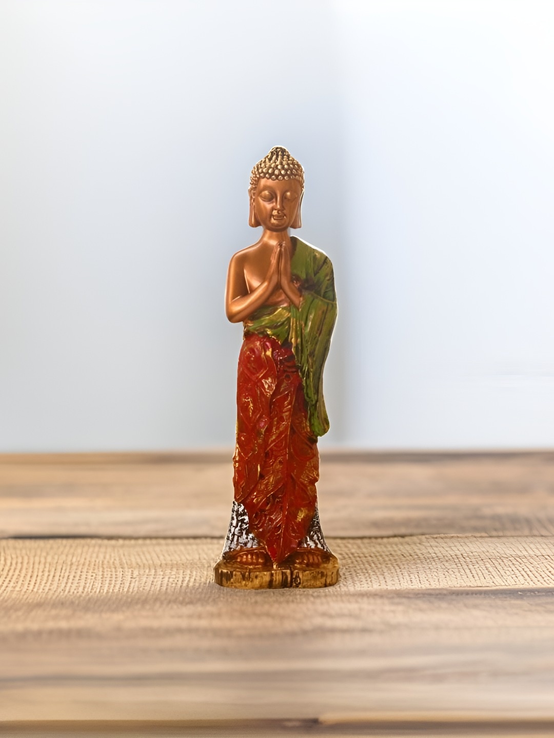 

BECKON VENTURE Gold toned & Red Buddha Idol Showpiece