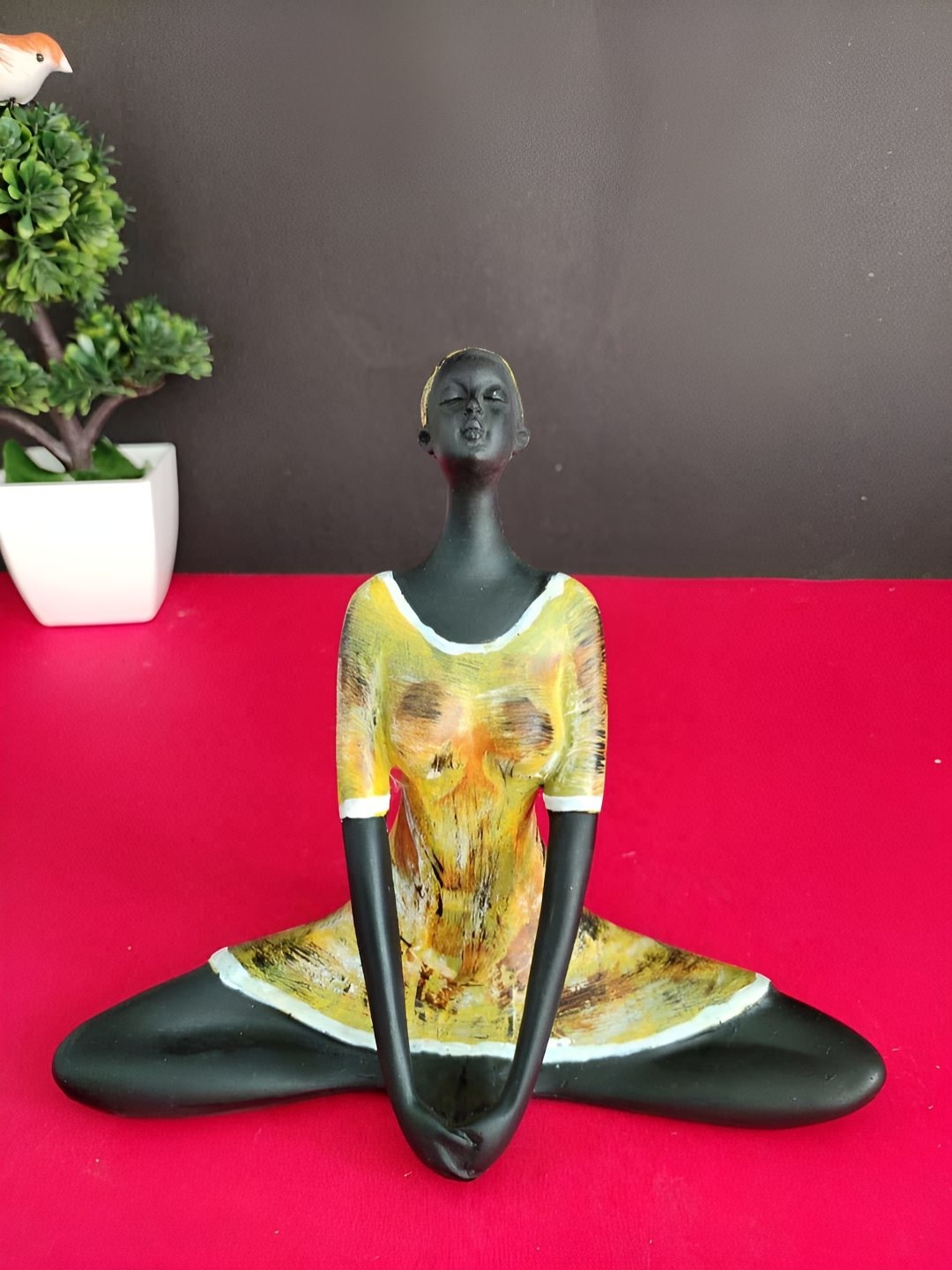 

BECKON VENTURE Yellow & Black Medium Figurine Showpiece