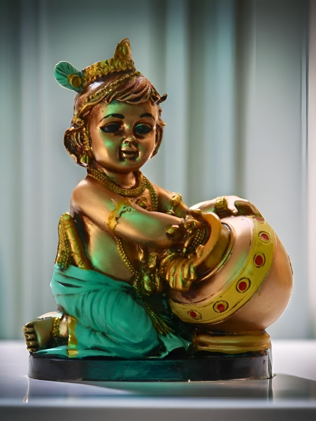

BECKON VENTURE Gold Toned & Green Religious Idol Showpiece