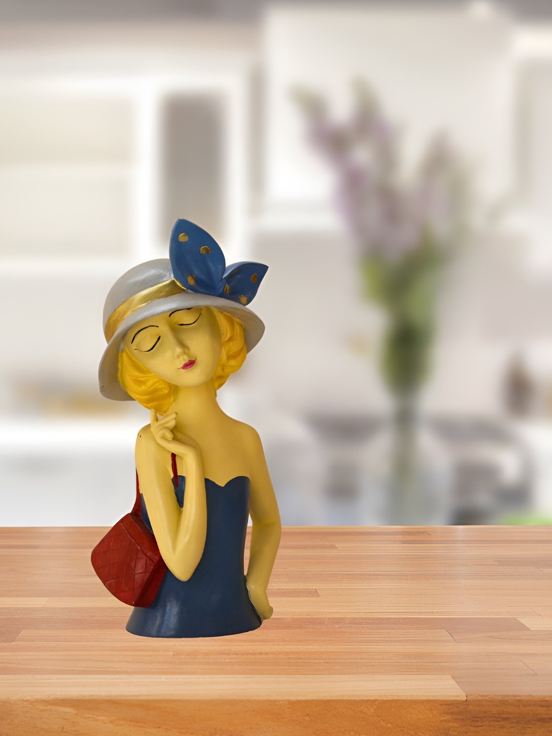 

BECKON VENTURE Yellow & Blue Medium Figurine Showpiece
