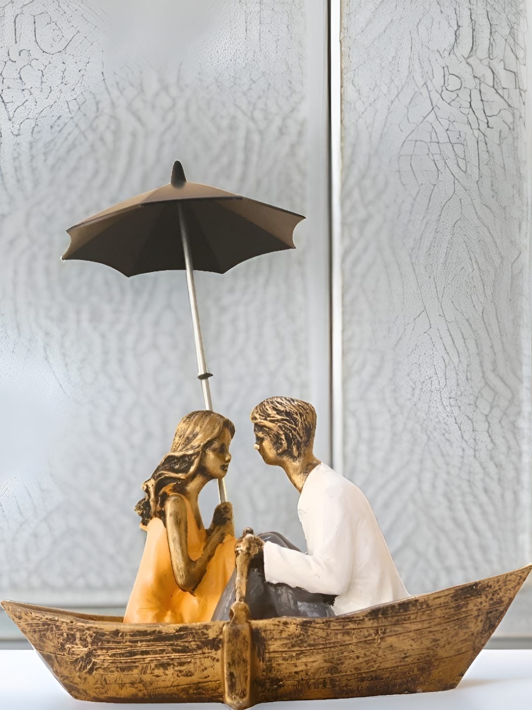 

BECKON VENTURE Gold toned & Black Medium Figurine Showpiece